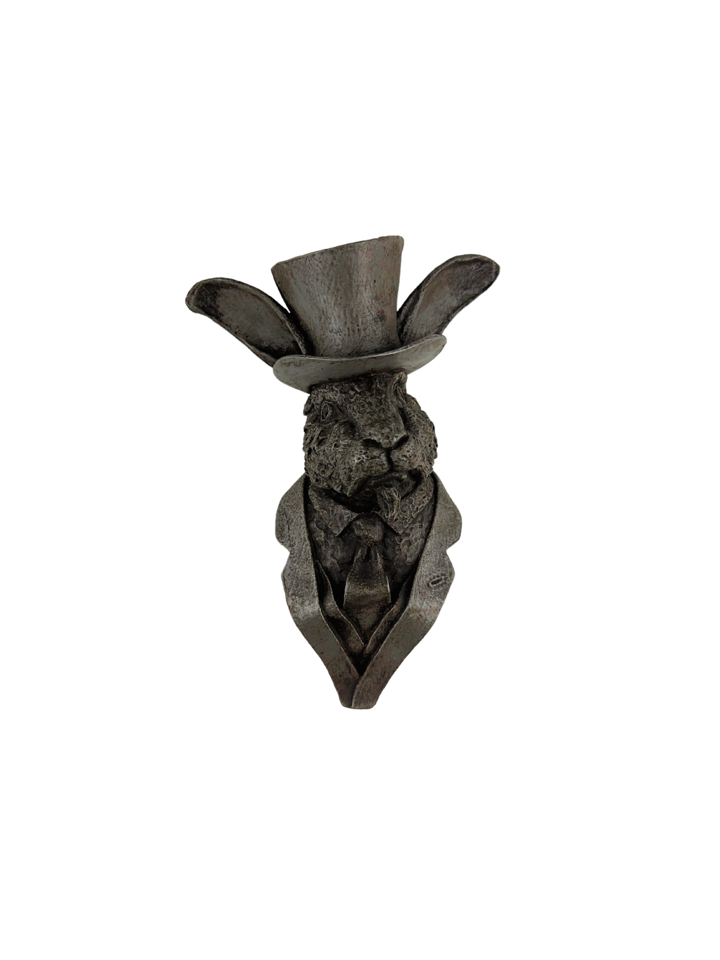 Handcrafted rabbit wall sculpture with classic pose and refined details like a top hat and tie, made by an artist, unique and utterly giftable