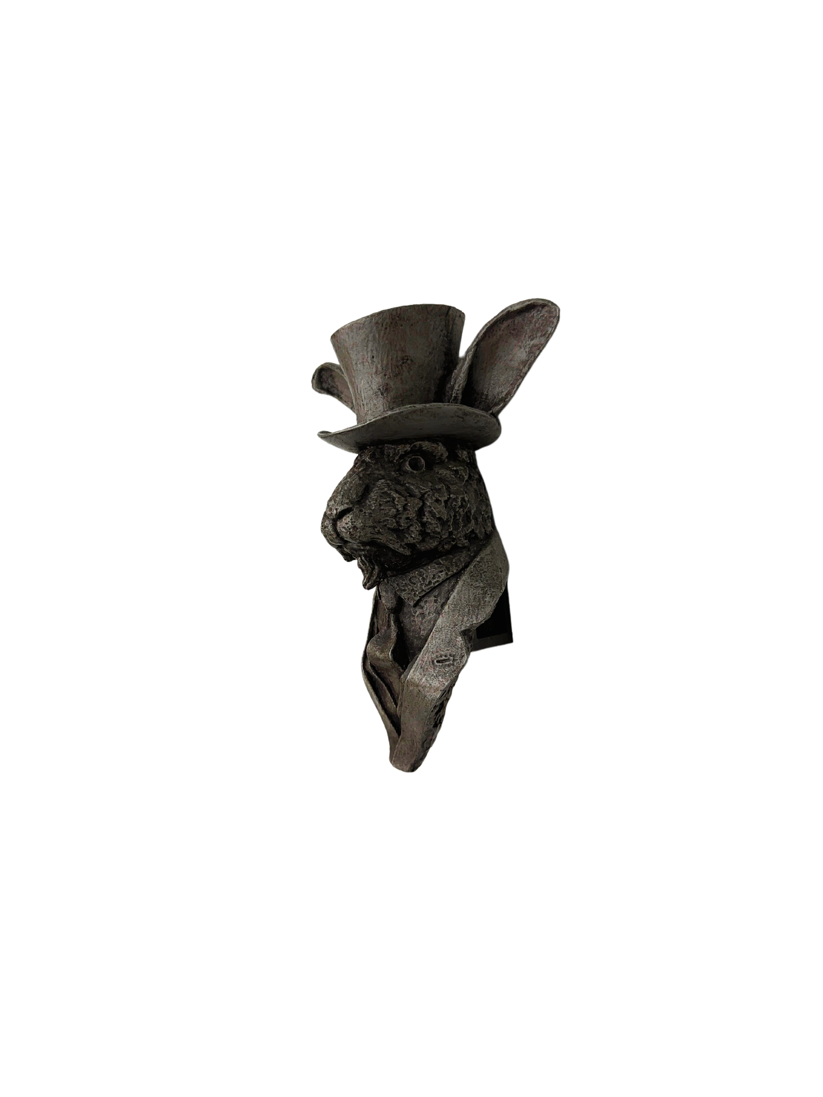 Left profile view, handcrafted rabbit wall sculpture with classic pose and refined details like a top hat and tie, made by an artist, unique and utterly giftable
