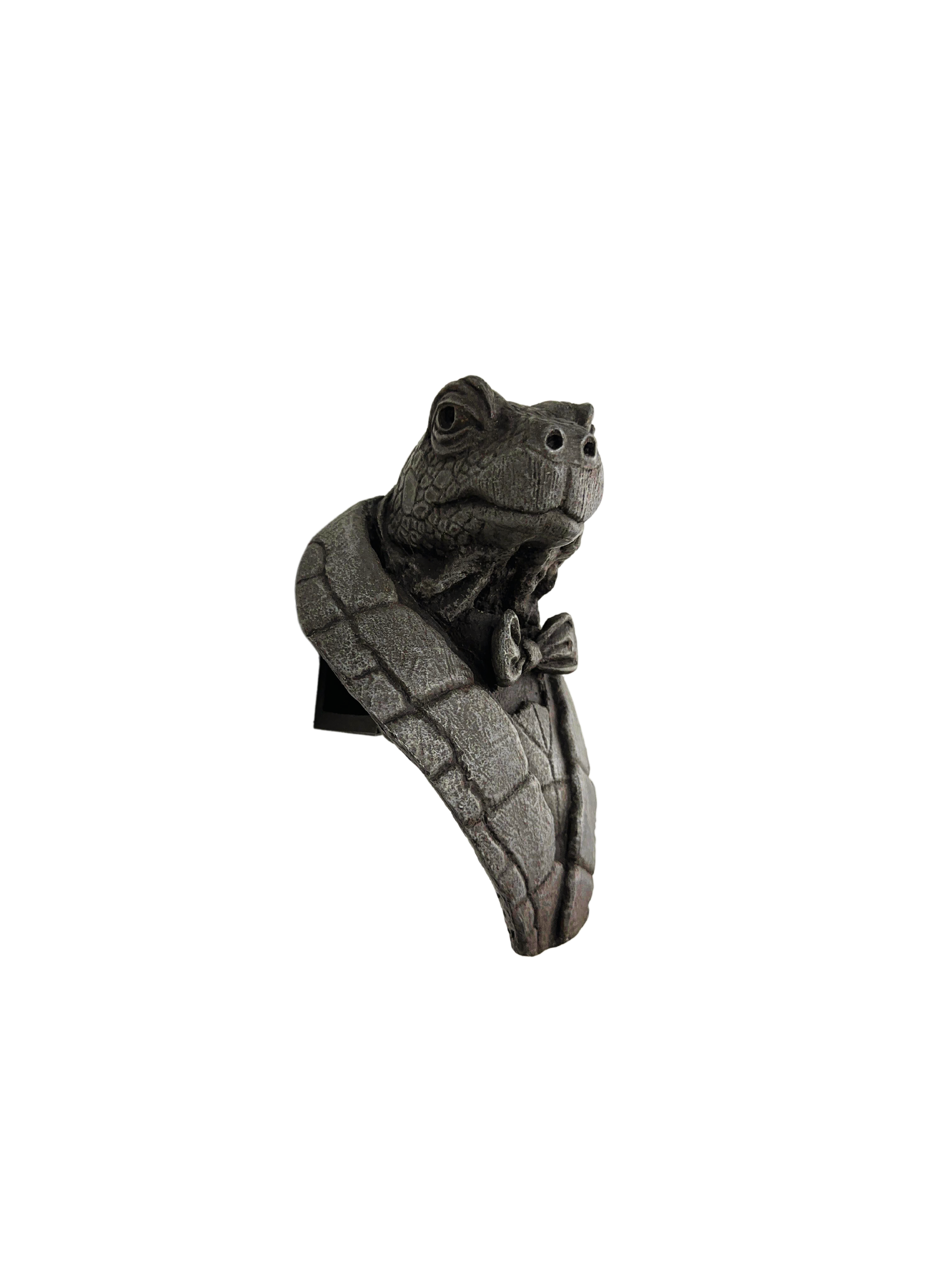Close‑up of Turtle sculpture showing detailed attire and facial features, unique, affordable art piece from Port of Curiosity.