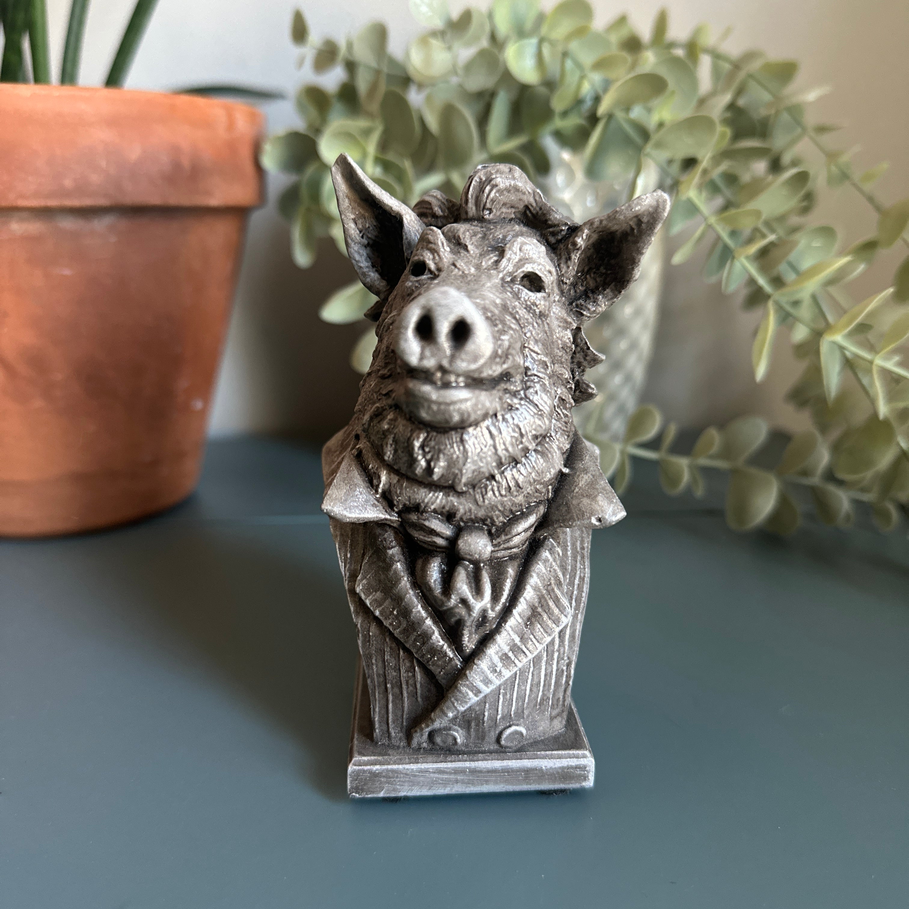 Our charming pig sculpture in a desktop scene